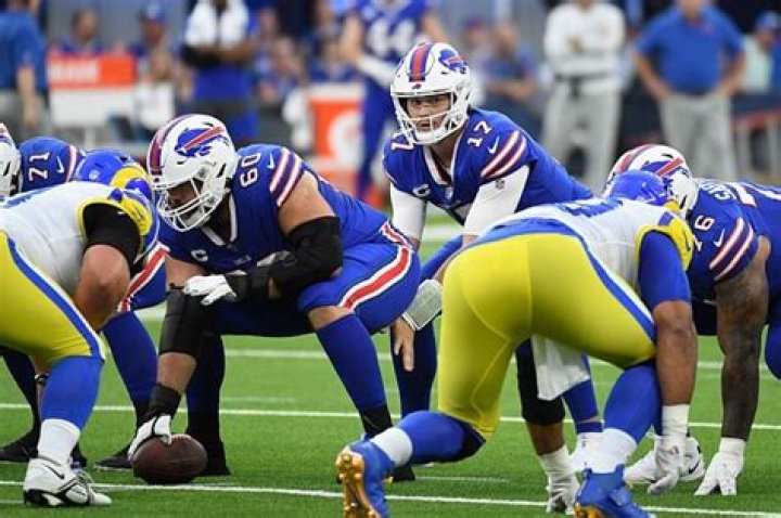 Can a player be in motion when ball is snapped?