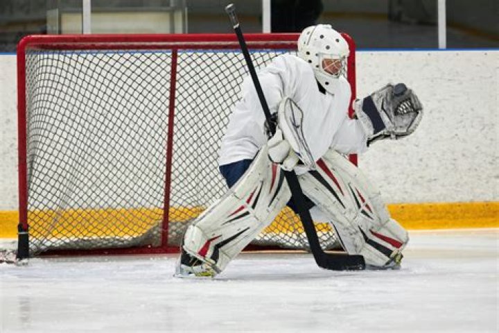 Can a player pick up a goalie stick?