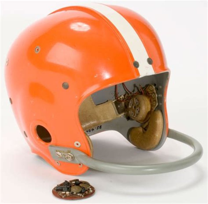 Do NFL quarterbacks have radio receivers in their helmets?