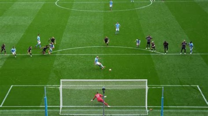 How far is a penalty kick in football?