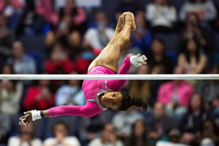 How high is Simone Biles in the air?