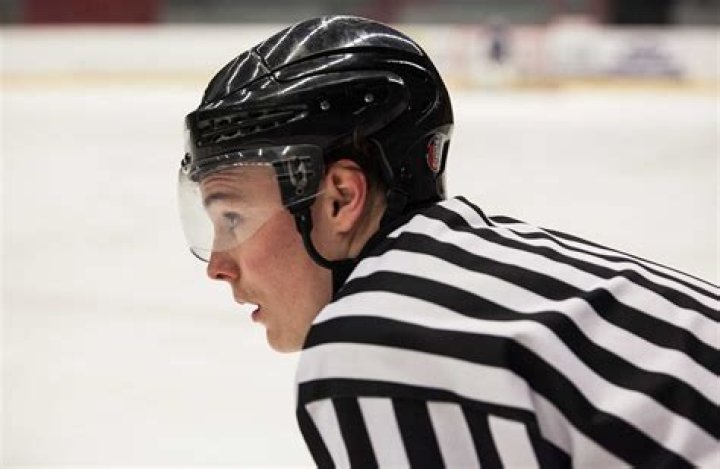 How many games do NHL referees work per year?