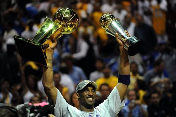 How old was Kobe when he won his first championship?