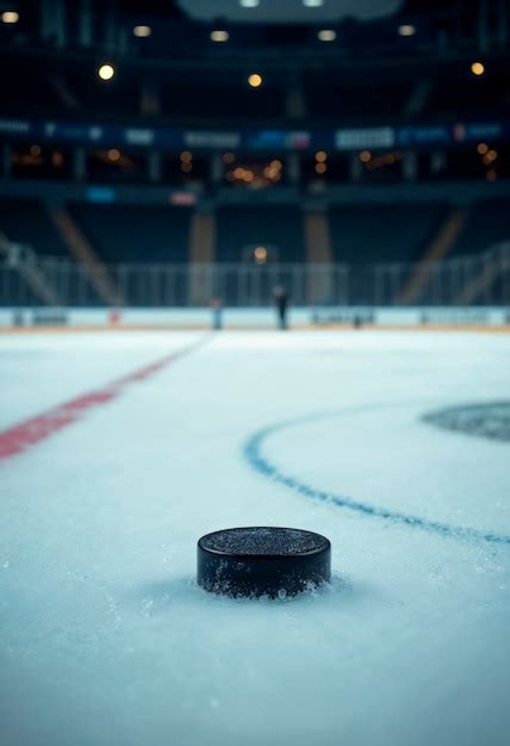 How thick is the glass on a hockey rink?