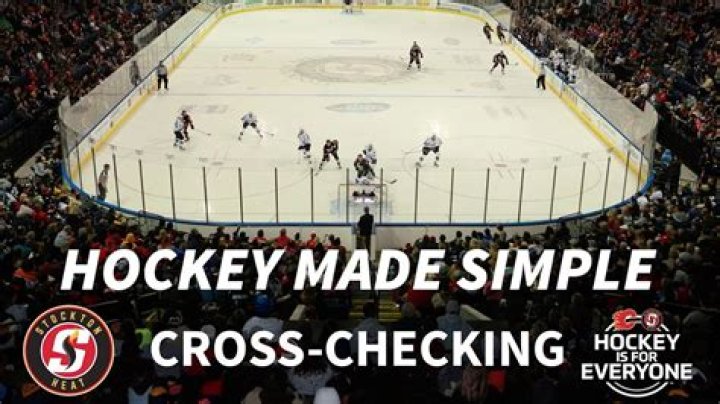 Is cross-checking illegal in hockey?