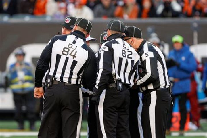 What do the letters stand for on football refs?