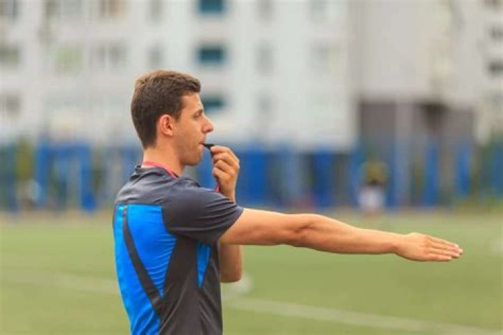 What do the whistles mean in soccer?
