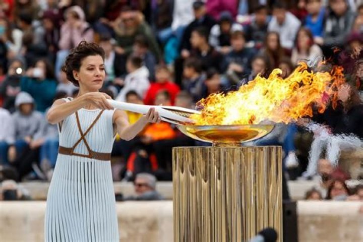 What happens to the Olympic flame after the Games?