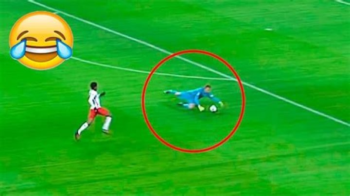 What happens when a goalkeeper handles the ball outside the box?