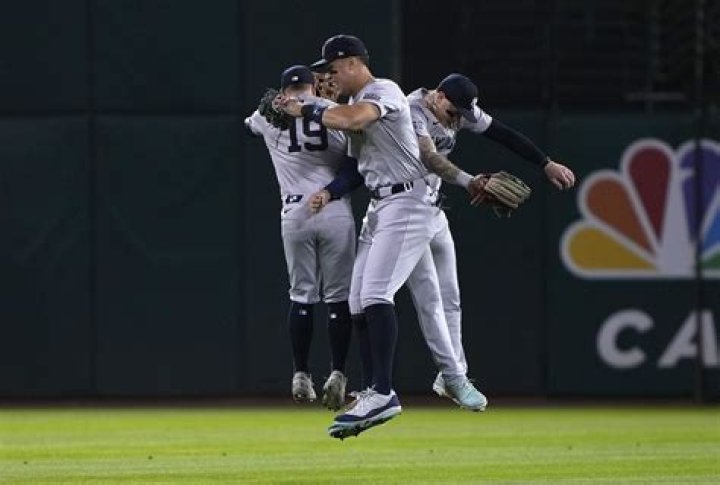 What is a ghost runner in extra innings?