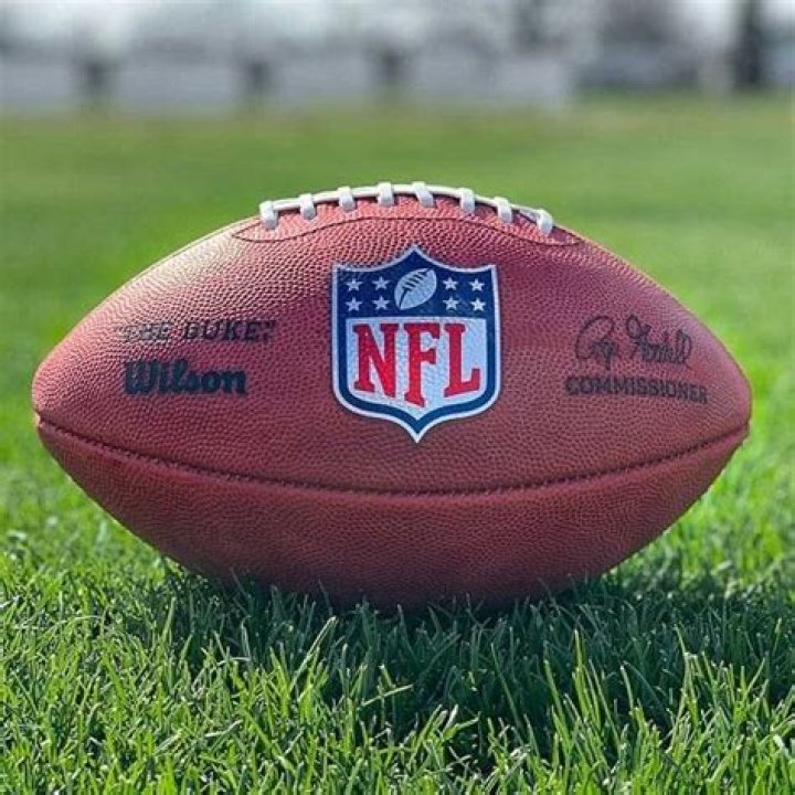 What is stamped on every NFL football?