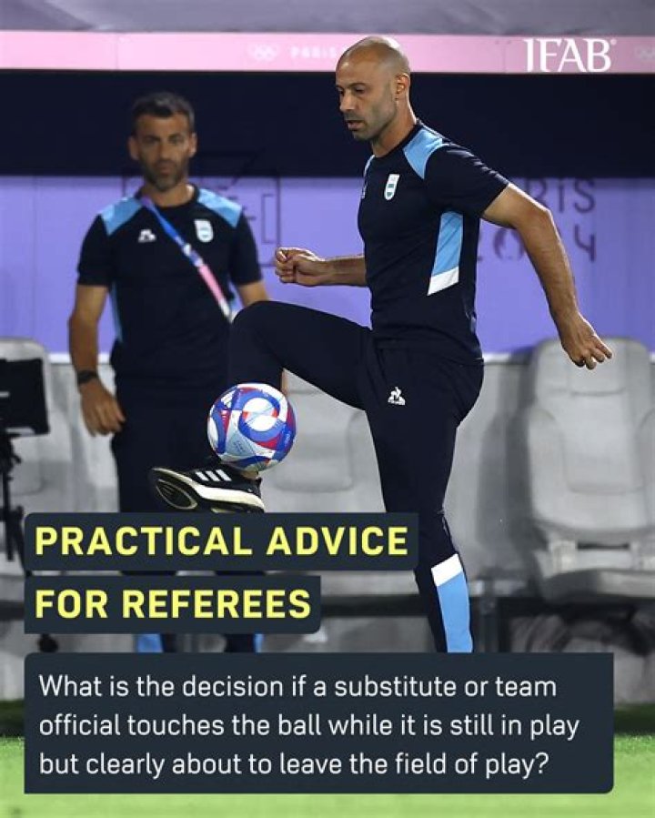 What is your decision if a ball touches the player before it goes out?