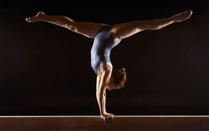 What level is handstand on beam?