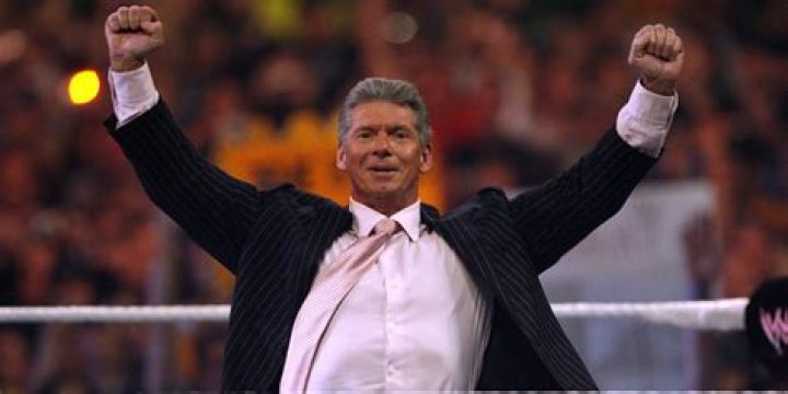 When did Vince McMahon tear both quads?