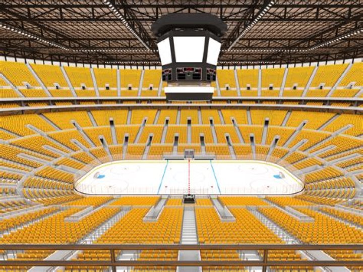 Where is the best spot to sit at a hockey game?