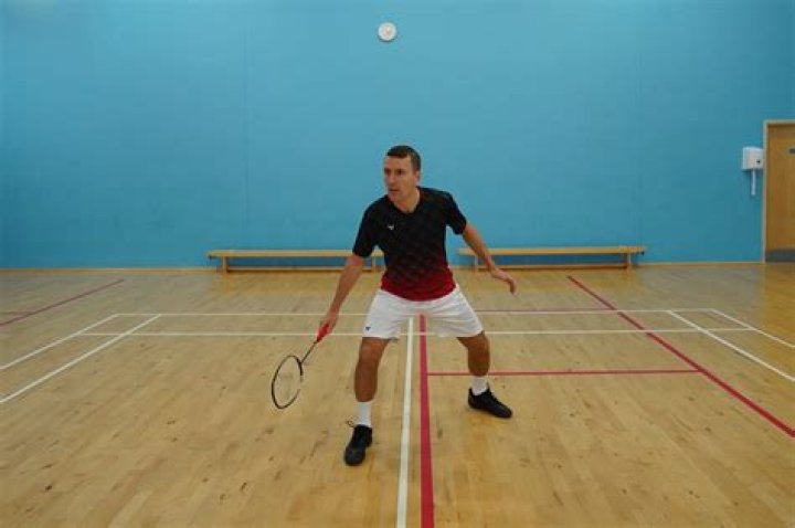 Which is harder badminton or squash?