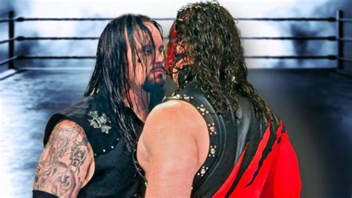 Who's taller Kane or Undertaker?