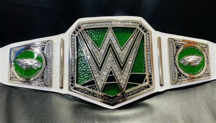 Who had 2 belts in WWE?