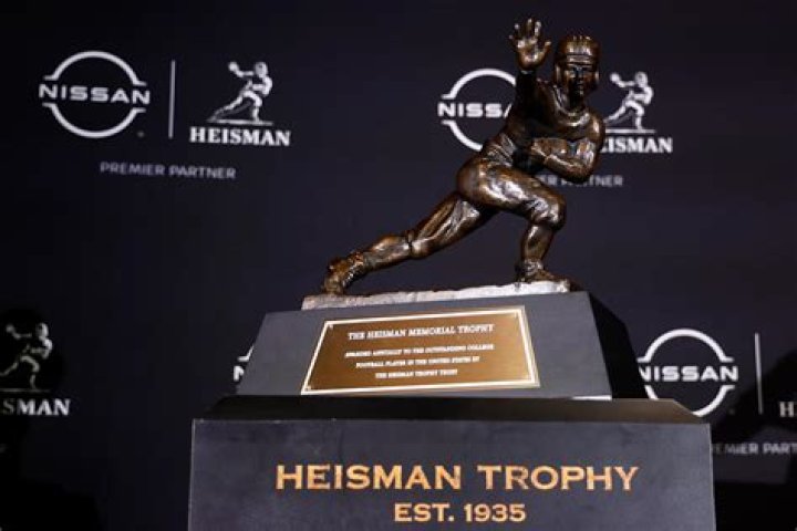 Who has won a Heisman national championship and Super Bowl?