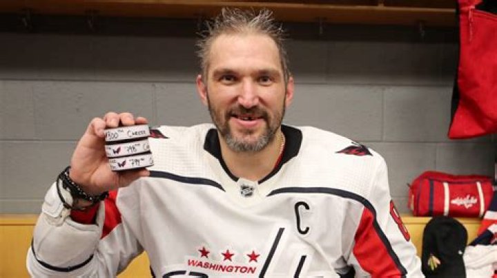 Who holds the record for most hat tricks in the NHL?