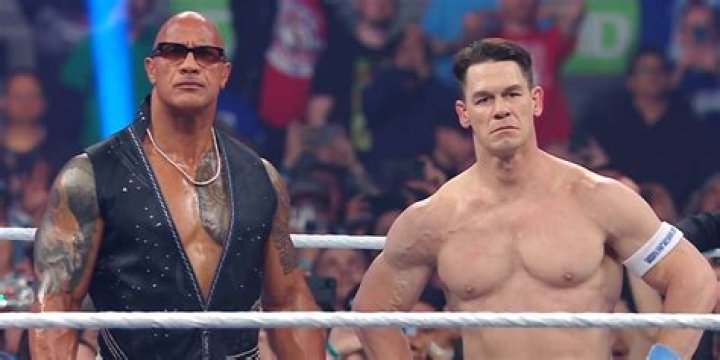 Who is related to The Rock in WWE?