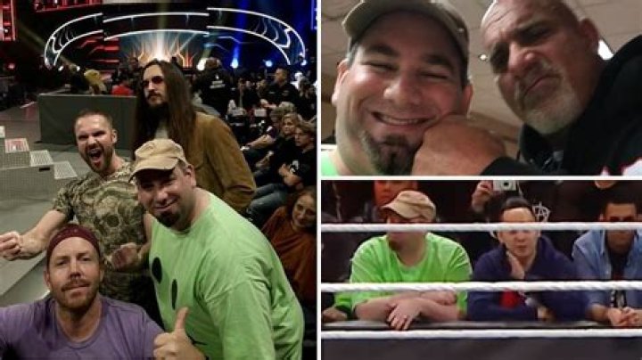 Who is the guy in the red hat at WWE events?