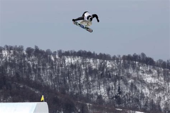 Who is the youngest snowboarder to ever medal and at what age?
