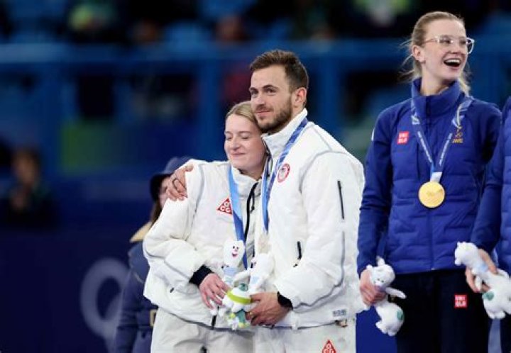 Who medaled in curling?