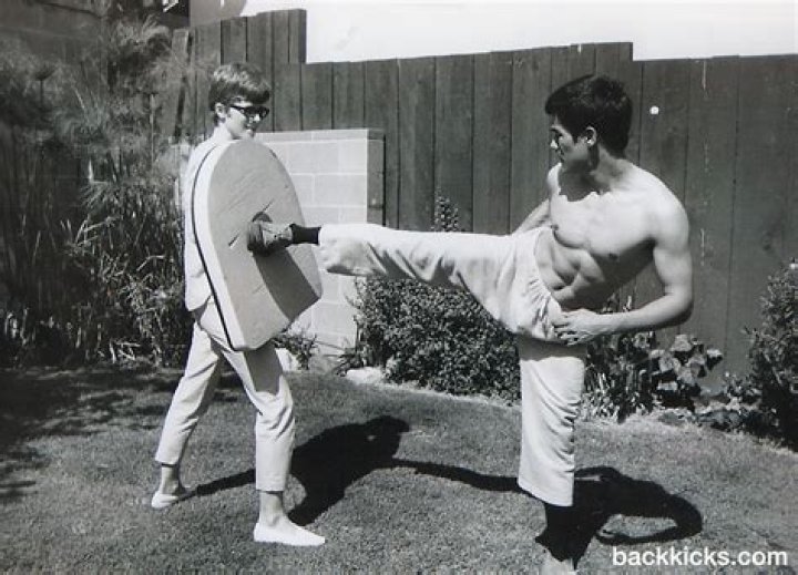 Who taught Bruce Lee martial arts?