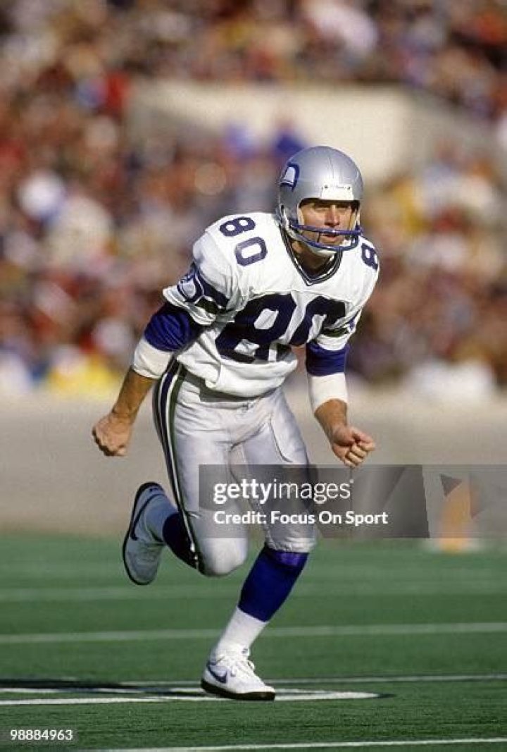 Who was the quarterback for Seattle when Steve Largent played?