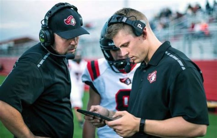 Why do coaches cover their mouths?