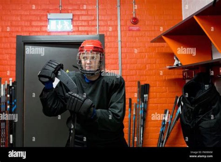 Why do hockey players drop their gloves before a fight?