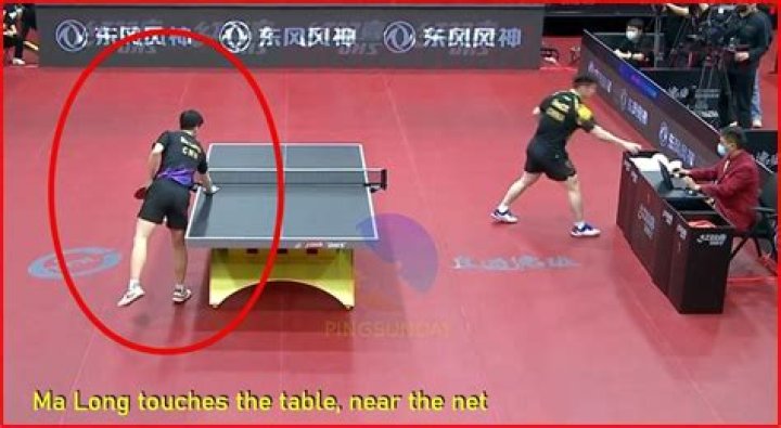 Why do table tennis players hold the ball before serving?